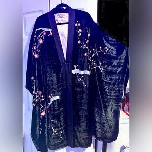 This one of a kind vintage kimono features a beautiful Japanese floral design.